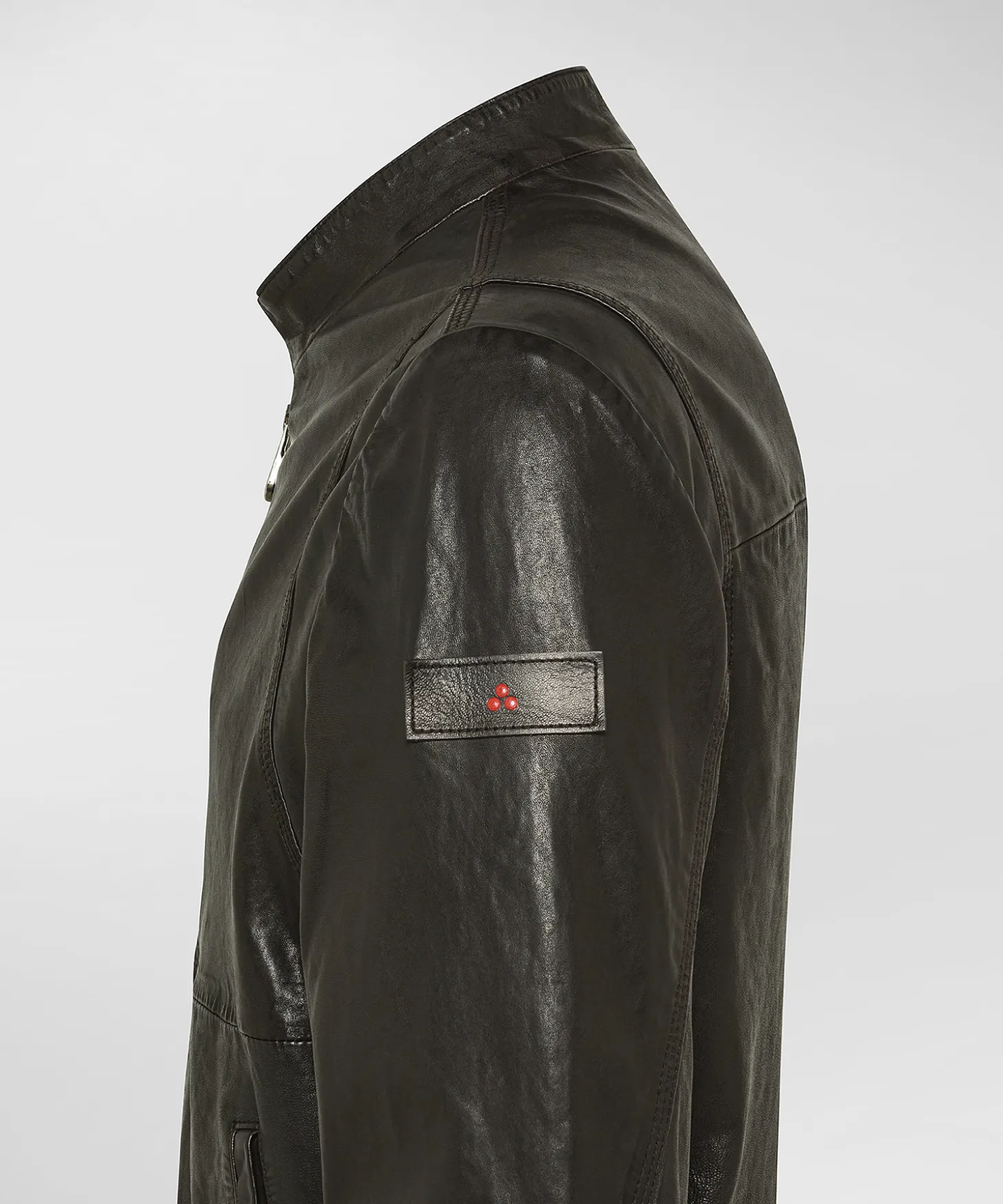 Bomber in pelle con dettagli in maglina elastica