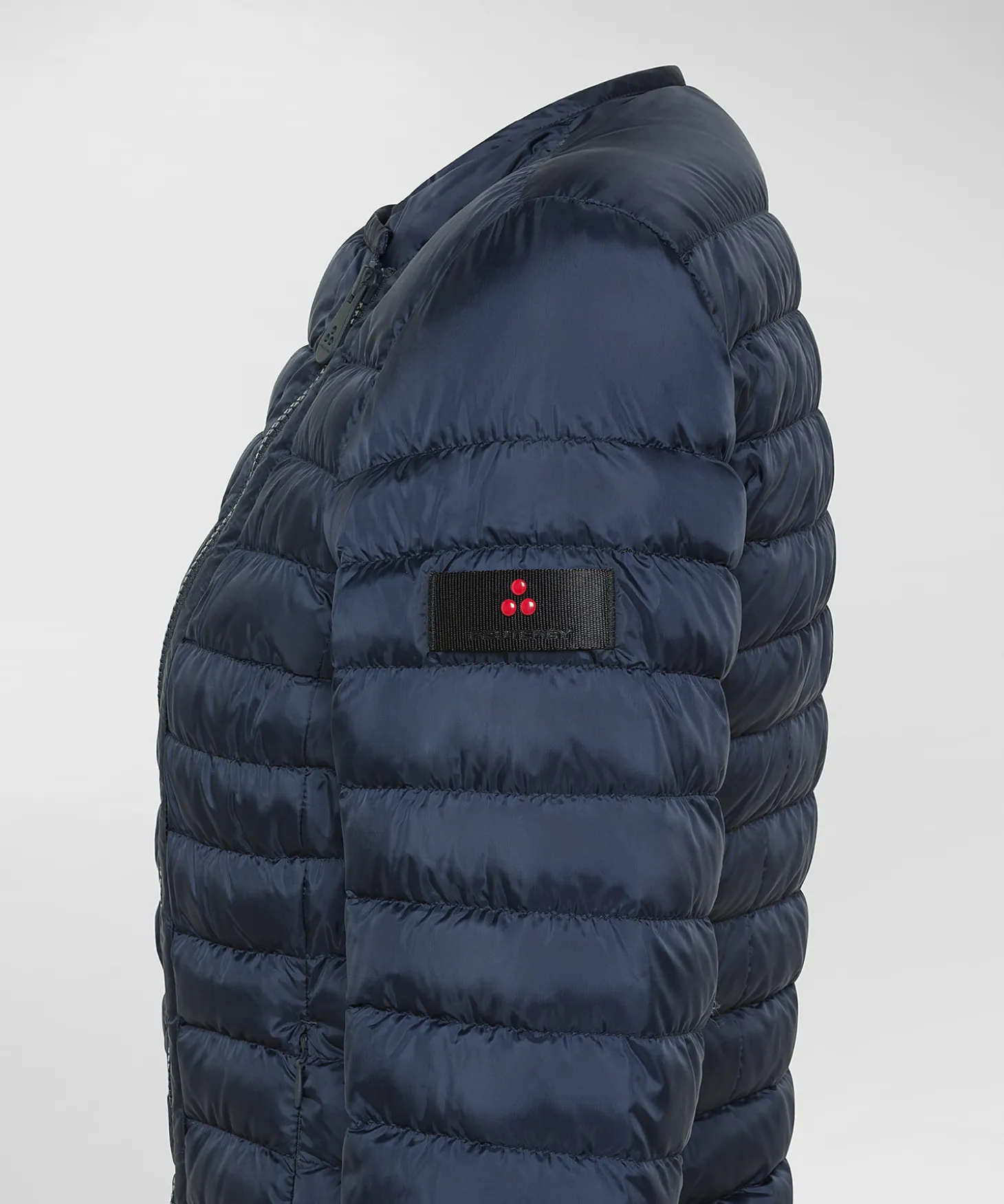 Piumino avvitato con zip obliqua