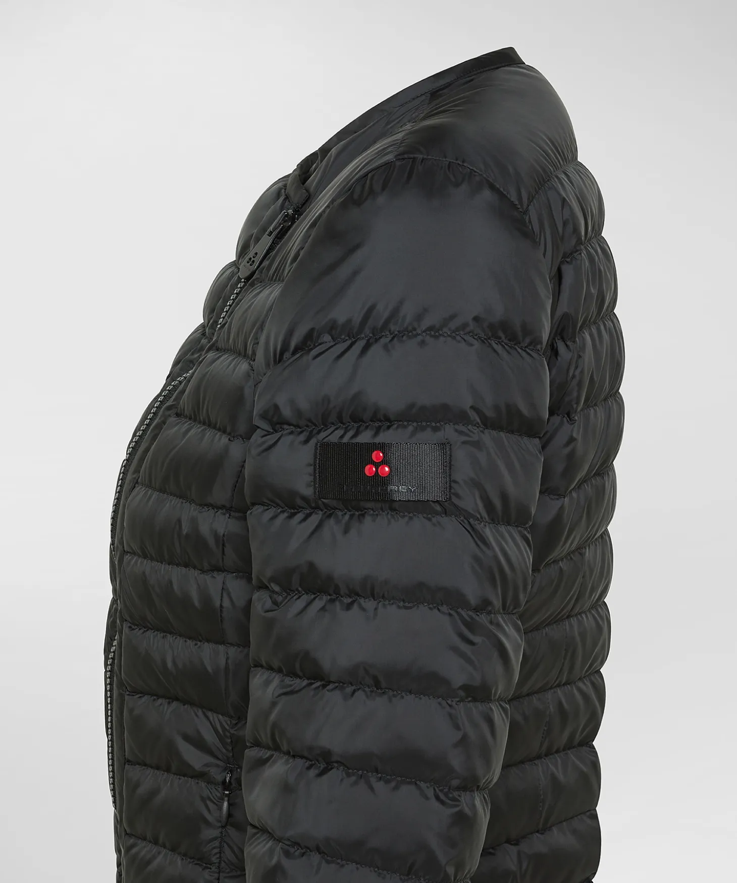 Piumino avvitato con zip obliqua