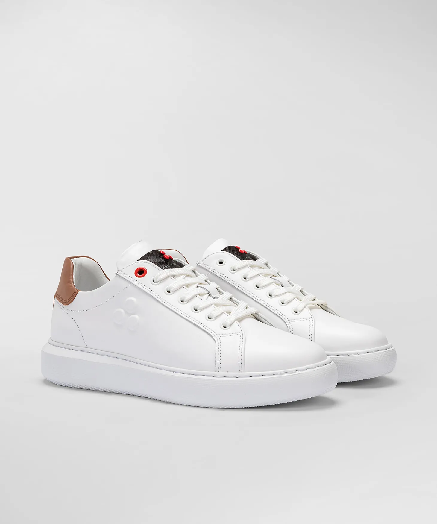 Sneaker In Pelle Con Logo Goffrato