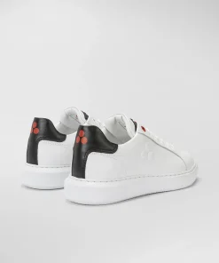 Sneaker In Pelle Con Logo Goffrato
