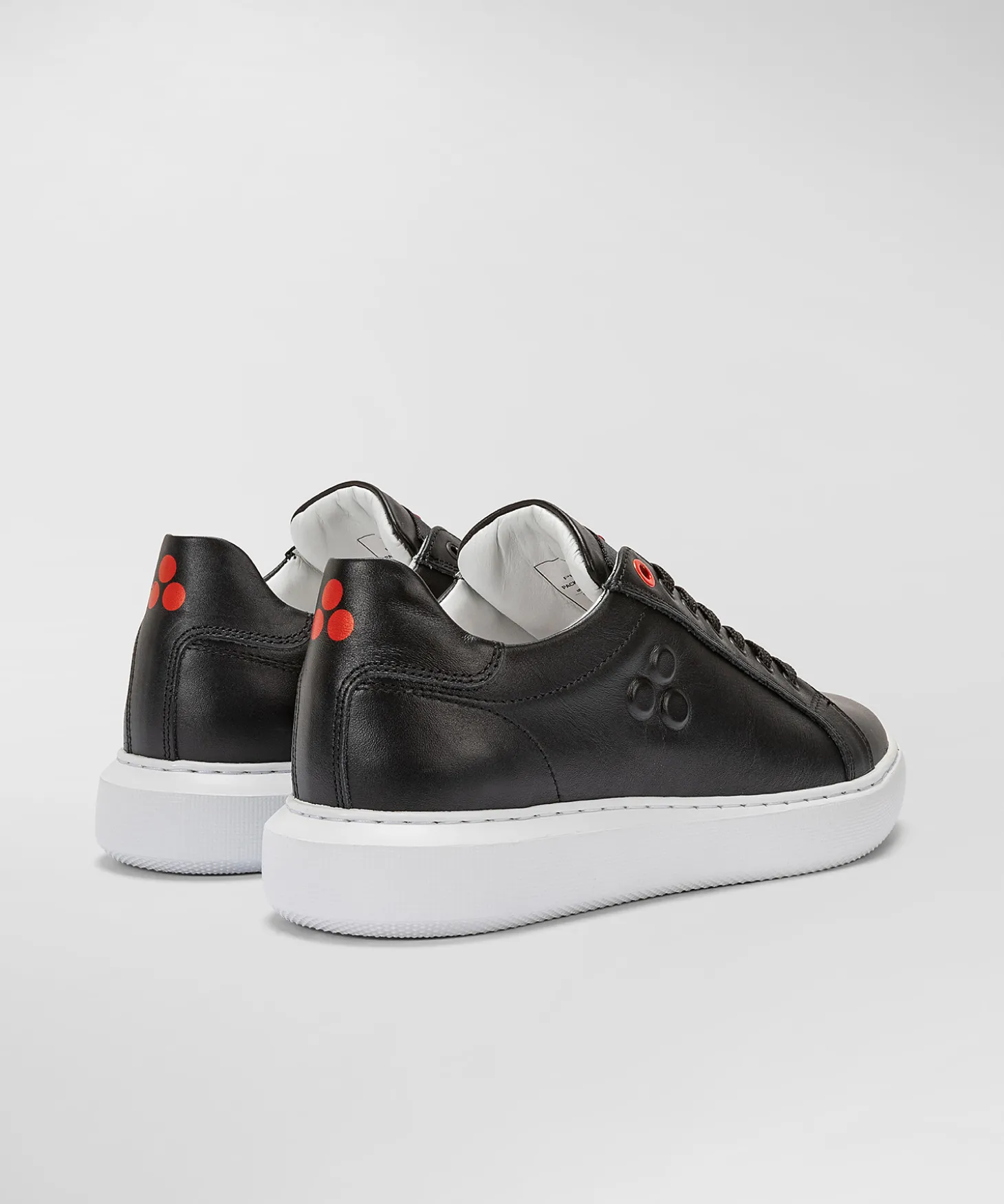Sneaker In Pelle Con Logo Goffrato