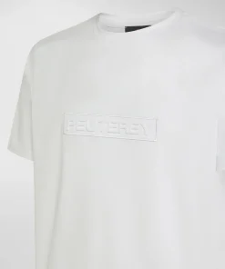 T-shirt con scritta in rilievo
